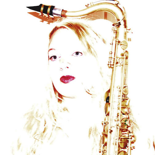 Music teacher Natasha Koczy with her saxophone. Natasha teaches sax, singing, piano and clarinet in Saltaire, near Bradford, West Yorkshire